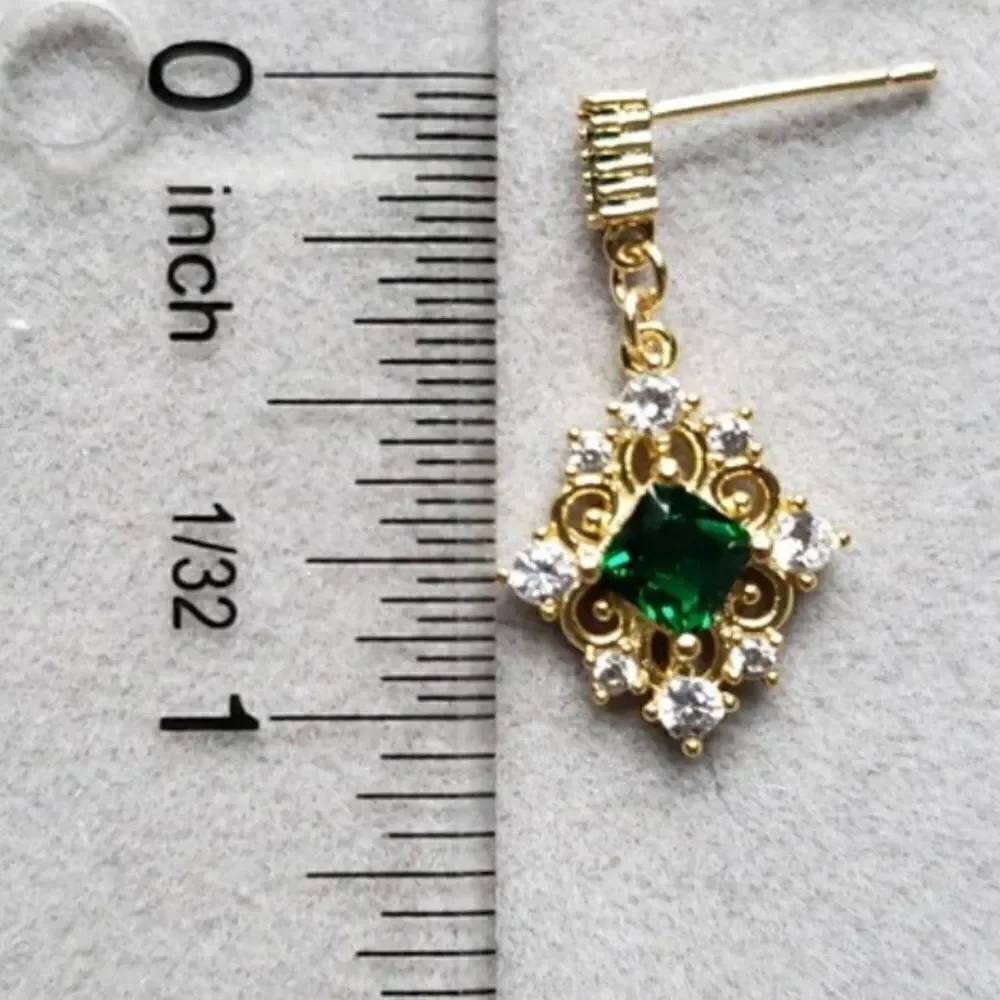 The Green Genesis Earring in gold
